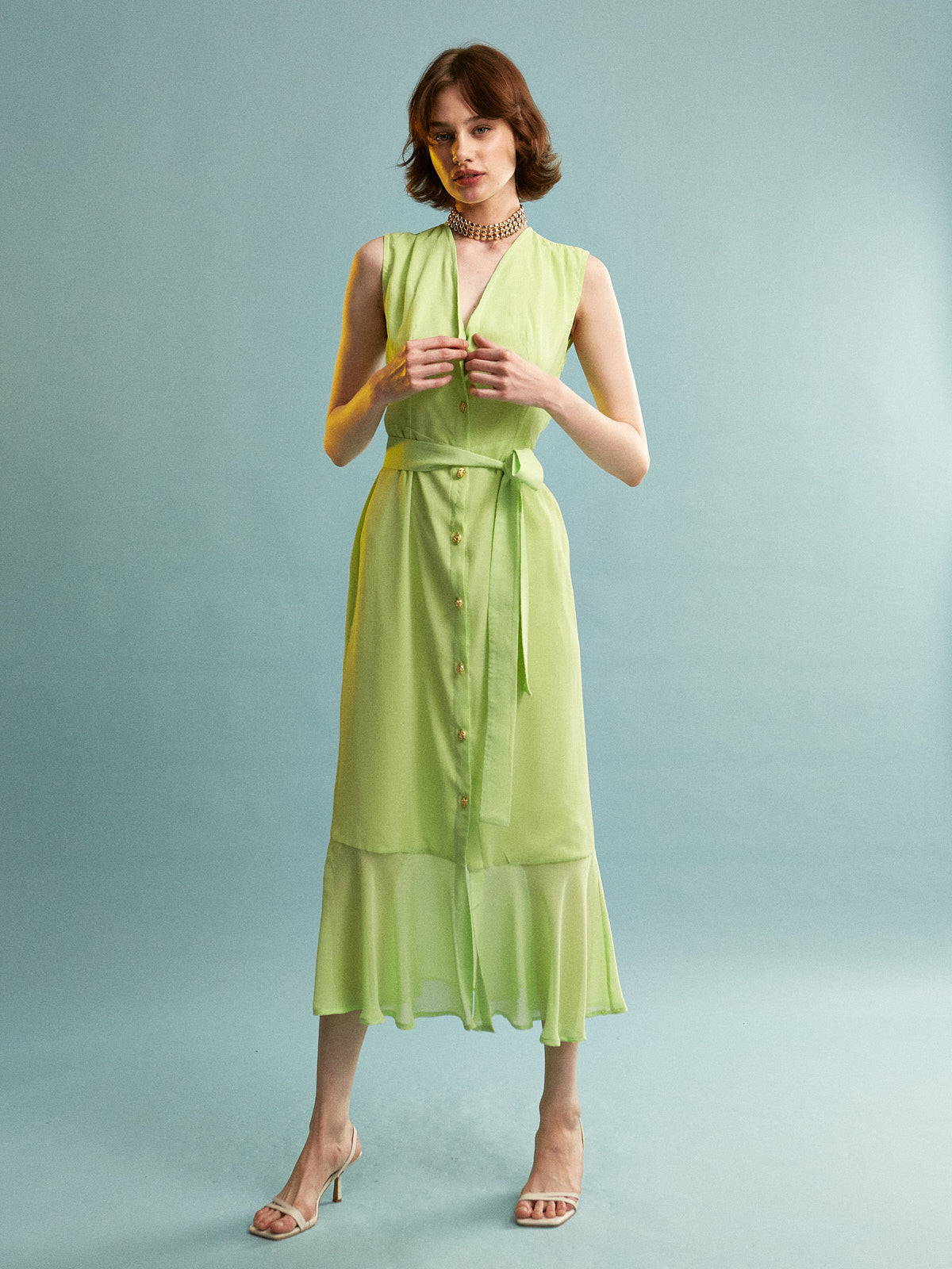 Amaya button sleeveless green dress